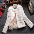 Women's short faux fur top in beige with regular sleeves, shown for street fashion layering.