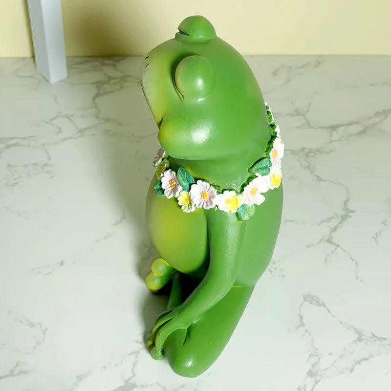 RDW123 coloured magic yoga frog resin and plastic ornament on a surface.
