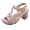 Women's patent leather high heel sandals with a thick heel and decorative metal buckle.