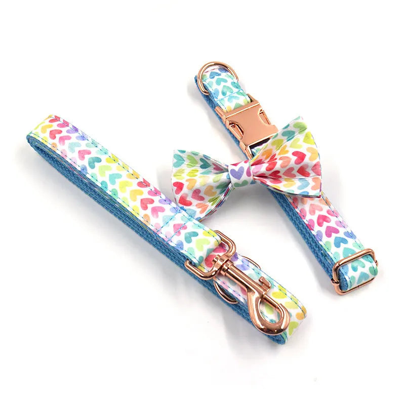 Rose gold cloth adjustable dog collar and lead rope set on a dog