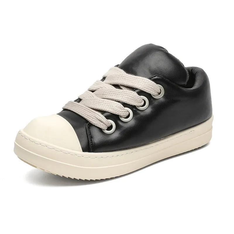 Black men's slip-on casual shoes with leather upper and rubber sole showing round toe and flat heel