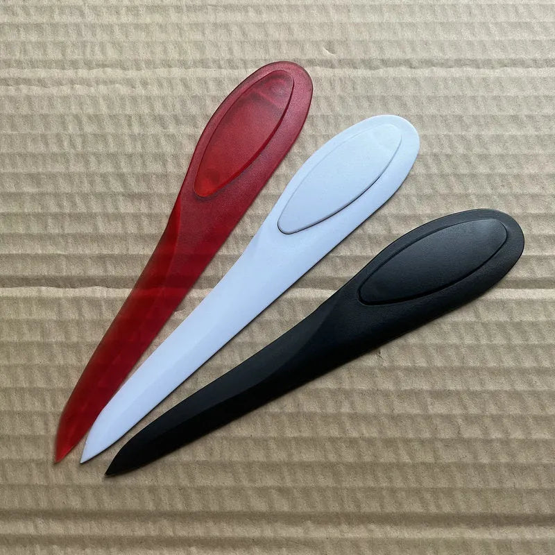 Willow Leaf Art A4 plastic paper cutter with colourful handle on white background
