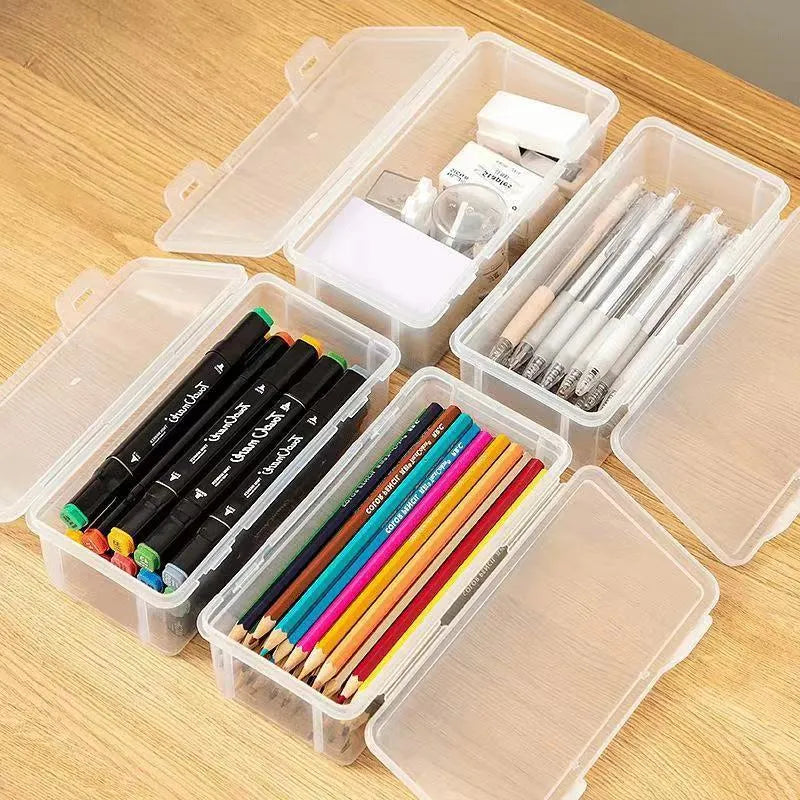 Large transparent pencil storage box with compartments for organising coloured pencils and drawing materials