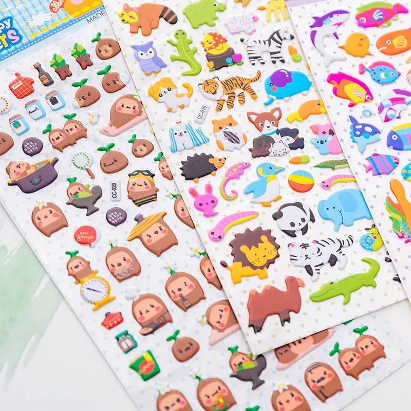 Sheet of cartoon-themed three-dimensional bubble stickers with raised surfaces on various designs like an alpaca, dinosaur, and bow tie cat.