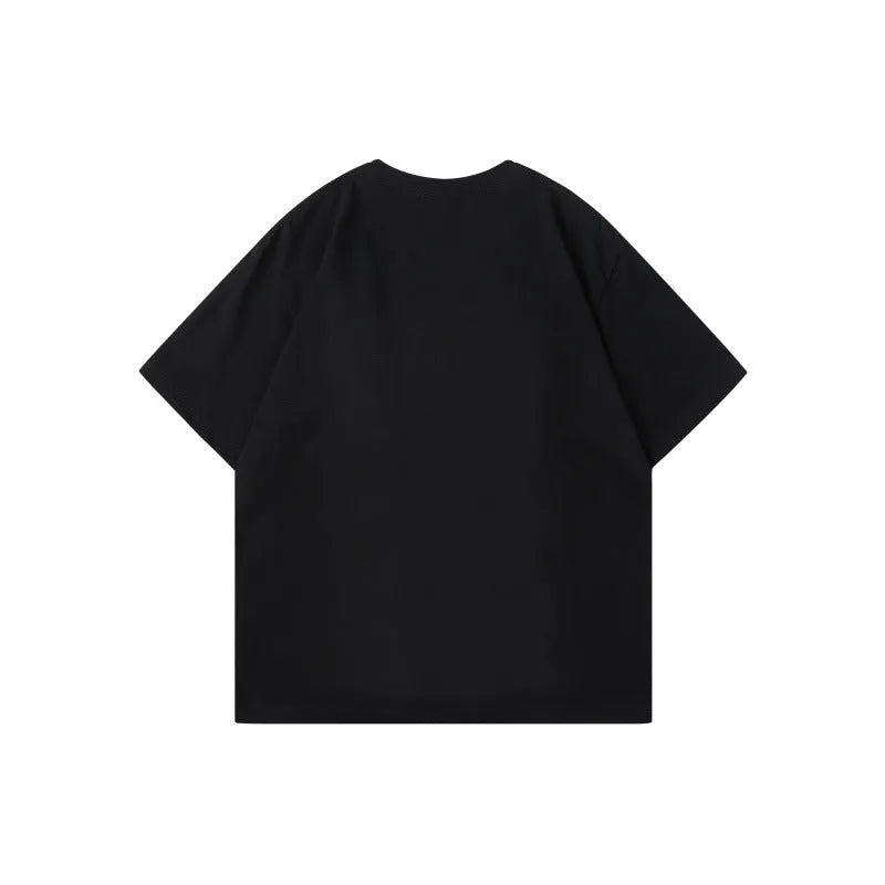 Loose fit cotton t-shirt with colour contrast patchwork and letter pattern design.