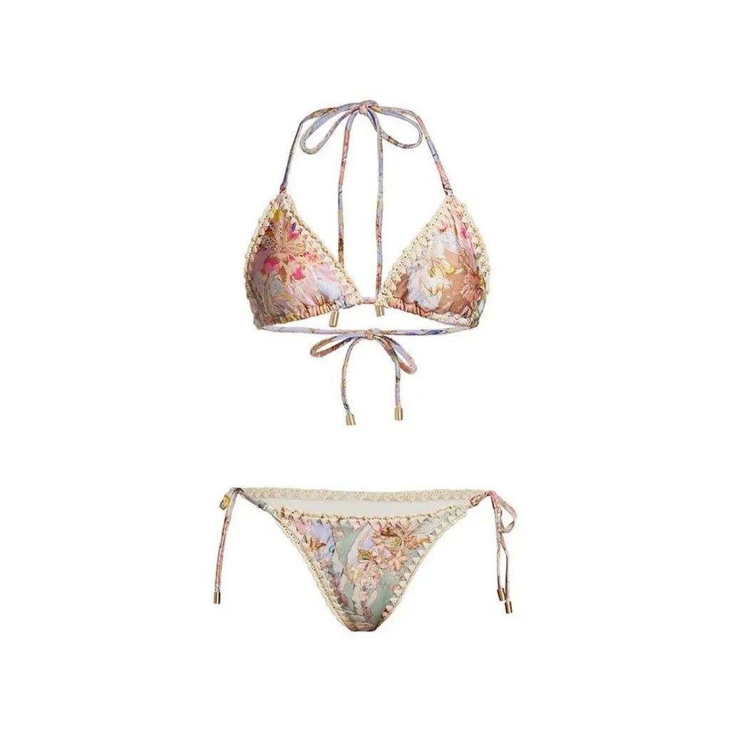 Women's creamy-white floral bikini set with matching skirt for beach holidays