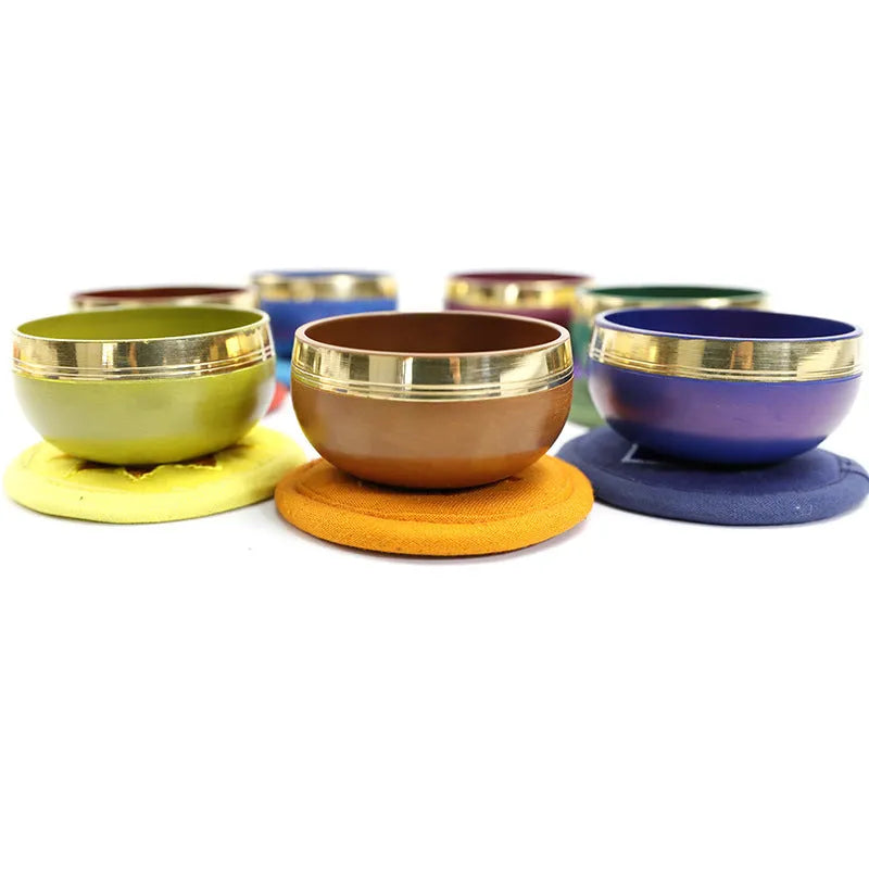 Handmade colourful Himalayan singing bowl percussion instrument with mallet for meditation and yoga