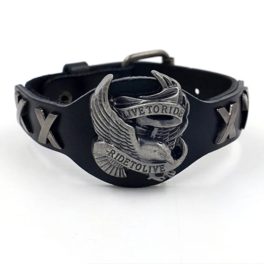 Black leather bracelet with a geometric alloy eagle decoration, showing the band's width variation.