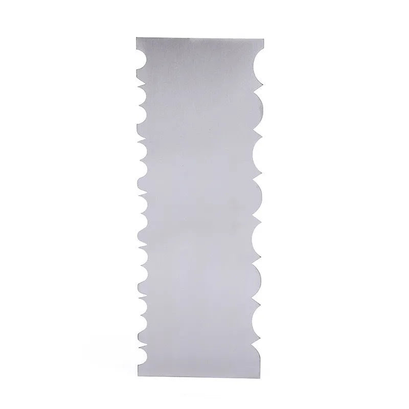 Stainless steel cake decorating scraper with a patterned polygon edge on a kitchen worktop.