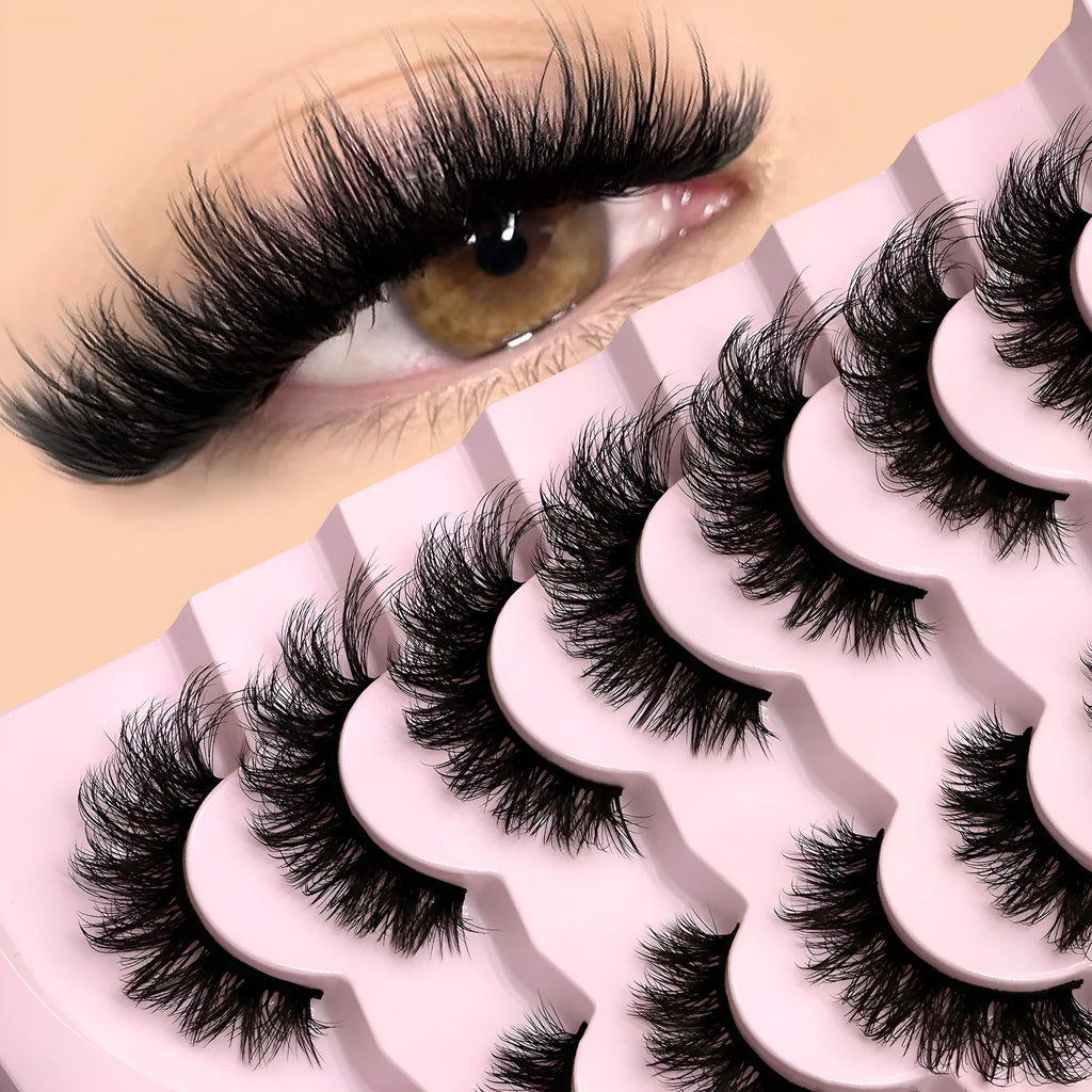 Box of artificial fibre false eyelashes in a natural long thick style with adhesive glue.