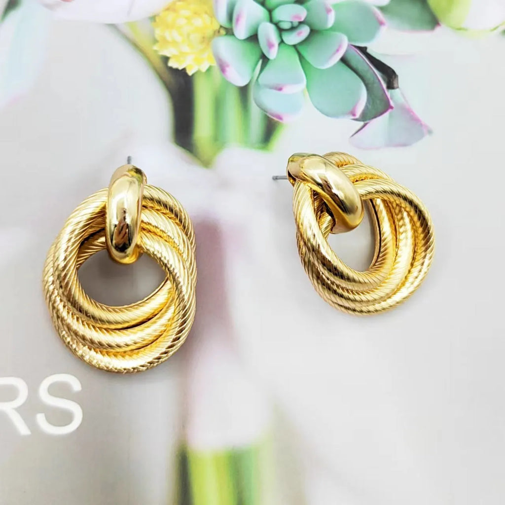 Gold electroplated geometric ring embossed twisted stud earrings for women, one pair