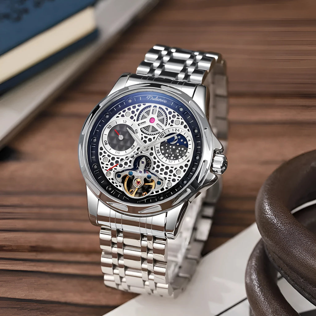 Automatic men's business watch with luminous hands on a steel bracelet.