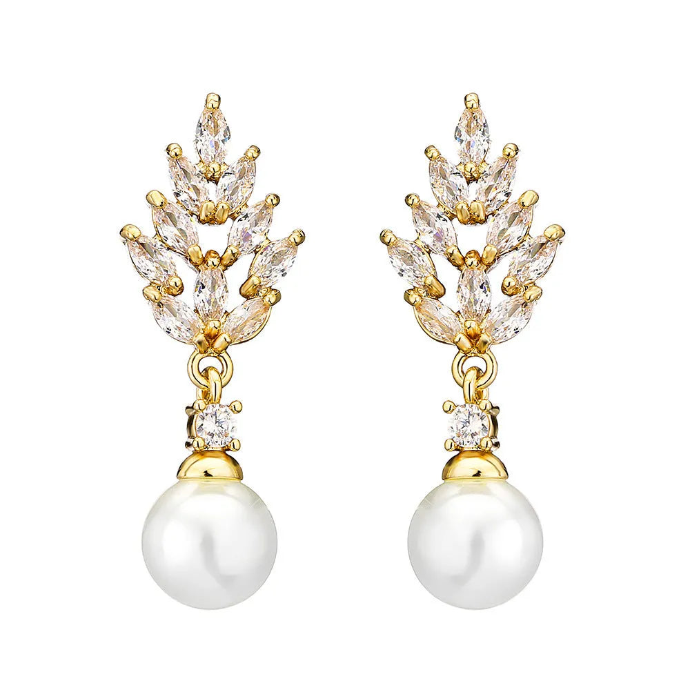Geometric flower-shaped earrings with micro inlaid zircon and pearl details on a gold-toned metal base.