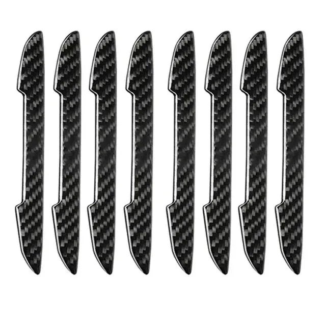 Black carbon fibre texture car door edge guard strips laid out, showing universal fit design.