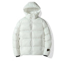Loose fit solid colour hooded cotton jacket in army green with side seam pockets on one person