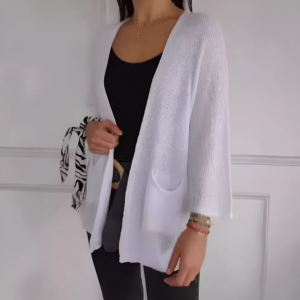 Women's waffle texture cardigan coat with nine-quarter sleeves shown in army green colour.