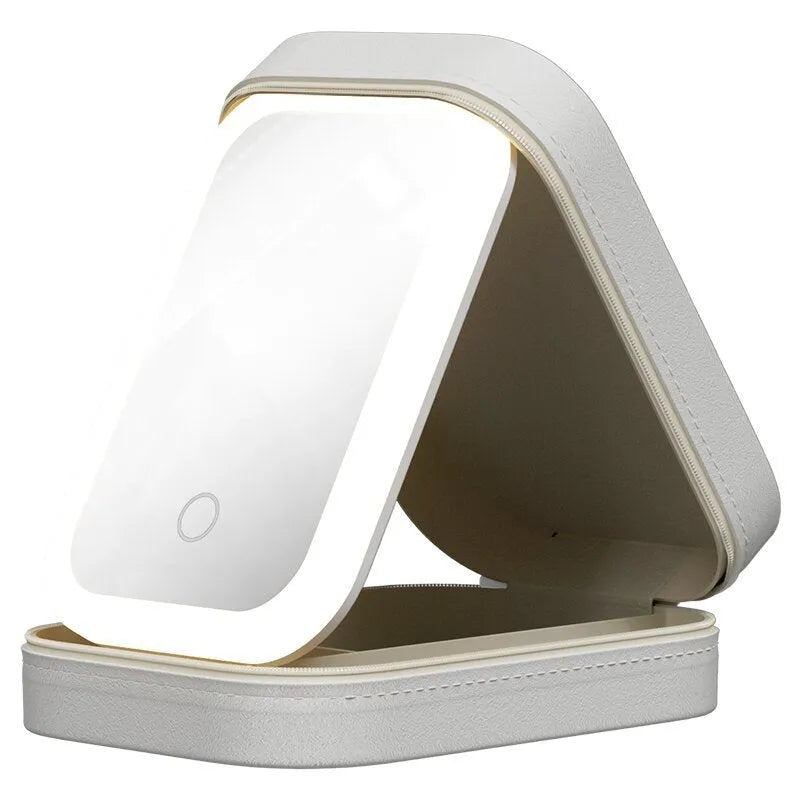 Pink portable makeup storage box with built-in LED light mirror and touch control, showing cosmetic storage compartment.
