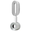 Self cleaning hair brush with one-key cleaning button and air cushion massage design in various colour options