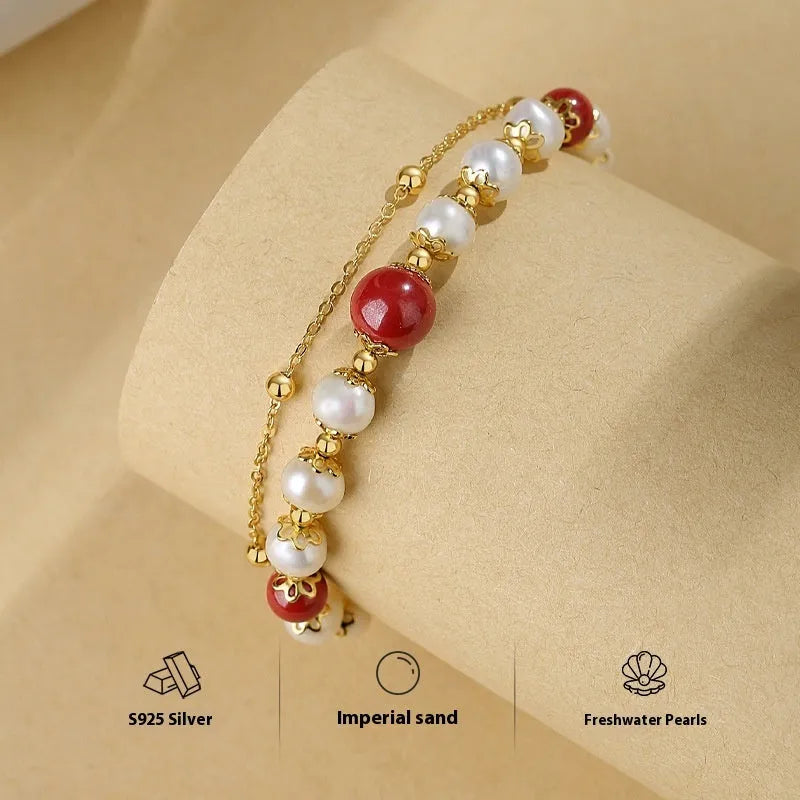 Silver double-layer bracelet with Chinese bean design and red cinnabar fresh water pearl necklace charm