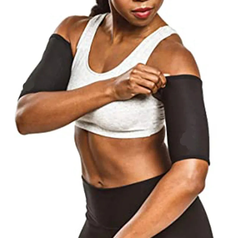 Adjustable black and red neoprene arm sweatband with Velcro strap wrapped around an upper arm.