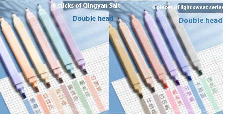 Set of double-headed fluorescent marking pens in bright colours on a white background.