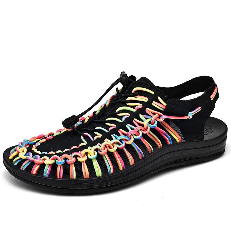 Woven sandals with an elastic drawstring tie closure in a rainbow colour option