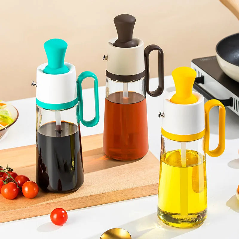 Yellow 2 in 1 oil dispenser with silicone brush next to glass bottle