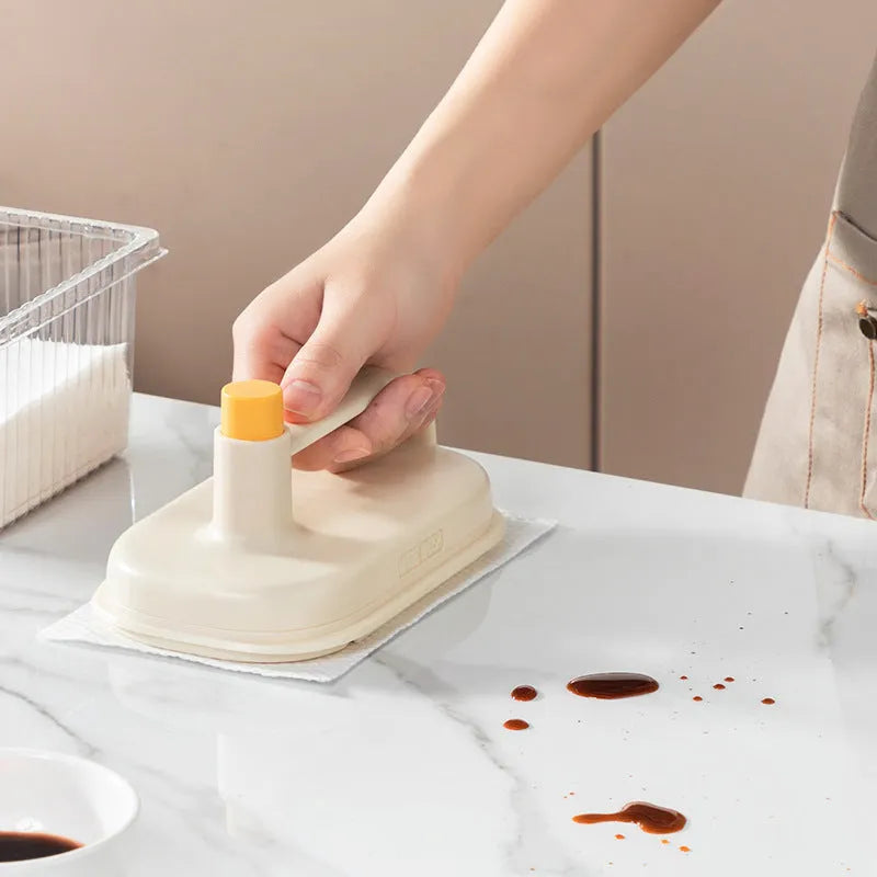 Magic Brush cleaning tool with disposable rag refills for multi-surface household cleaning