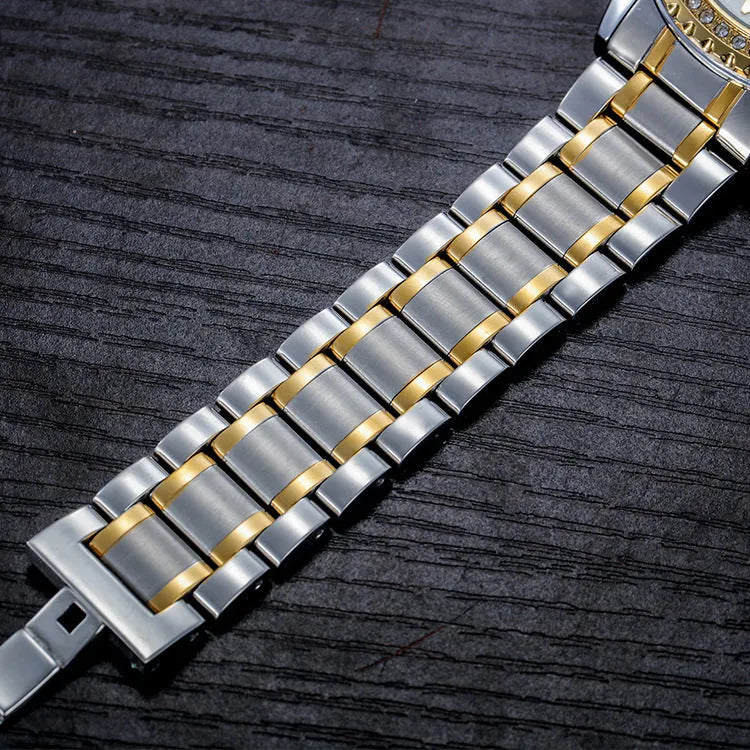 Fashionmonger men's gold automatic mechanical watch with black dial and luminous hands on a metal bracelet.