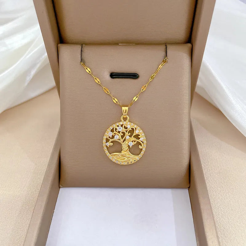 Gold-coloured adjustable necklace with an iridescent mother-of-pearl cross pendant on a detailed lip chain.