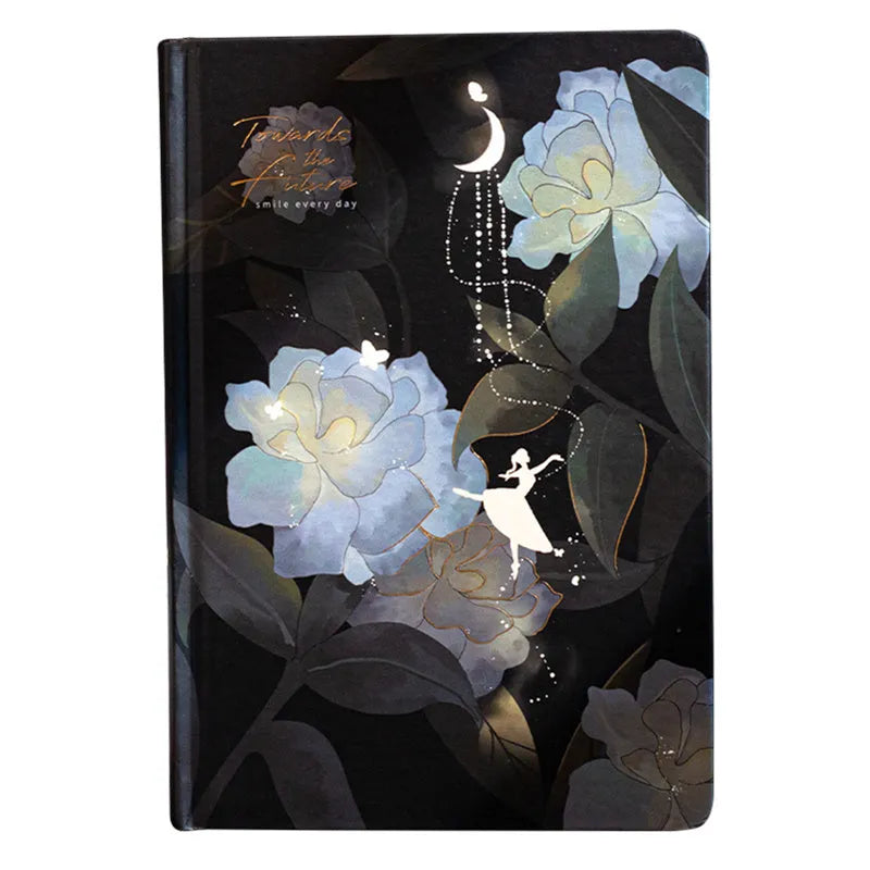 A5 notebook with luminous cover open to show pages filled with colour illustrations.