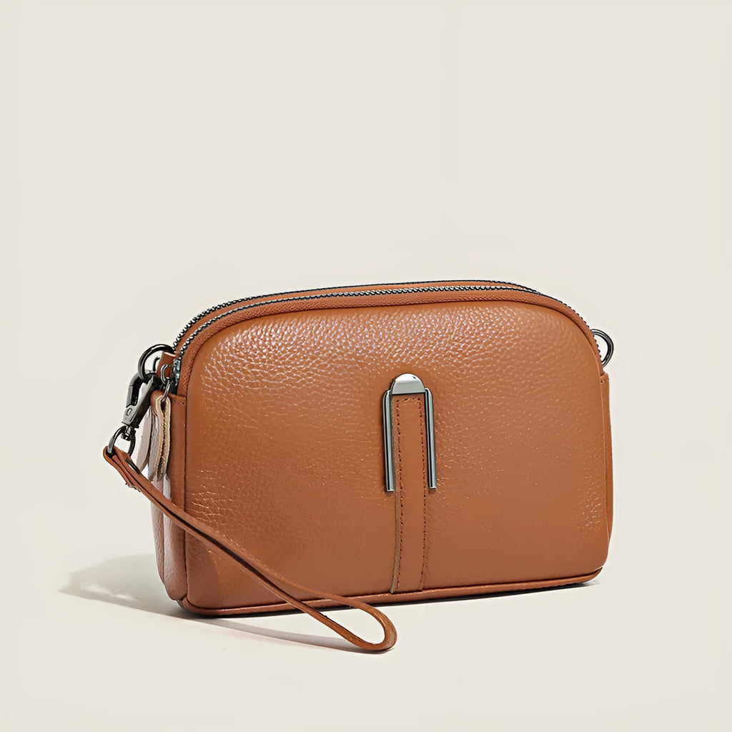 Top-grain leather crossbody bag with splicing design in khaki, horizontal shape, on model