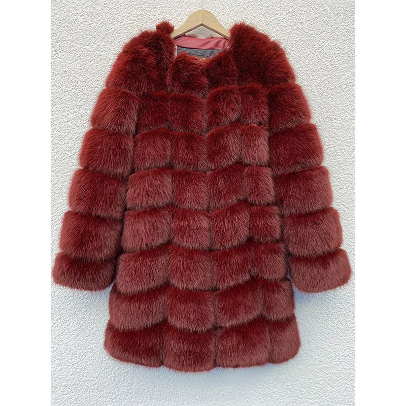 Women's long black artificial fur coat with regular sleeves, shown on a hanger.