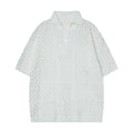 Black and white short-sleeved hollow knit polo shirt with a loose fit for teenagers