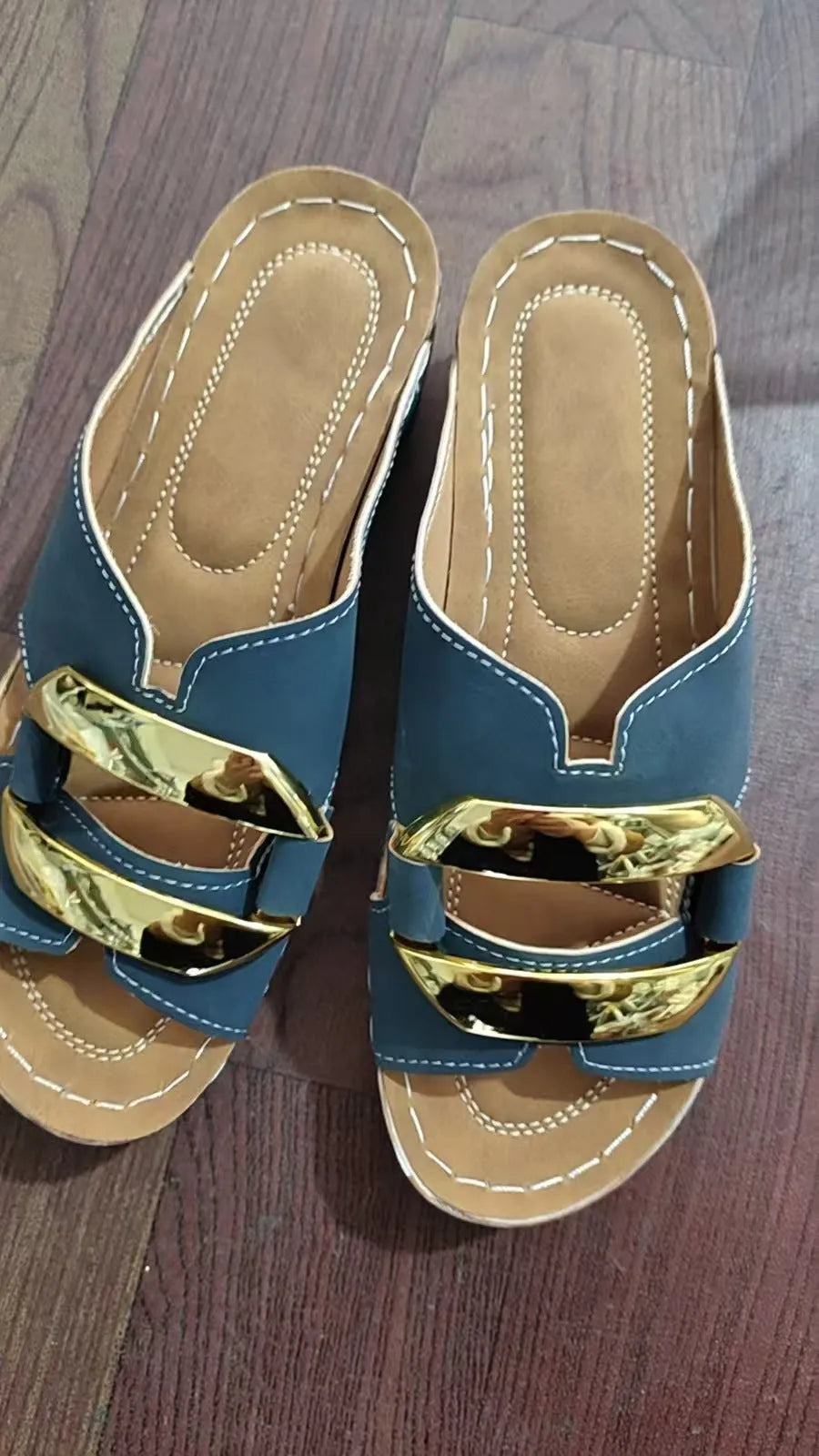 Roman style platform flip-flops in black with a breathable PU upper and rubber sole
