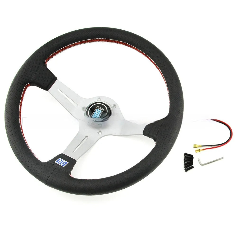 Leather-wrapped 14-inch steering wheel with a middle concave rim on a black metal skeleton.