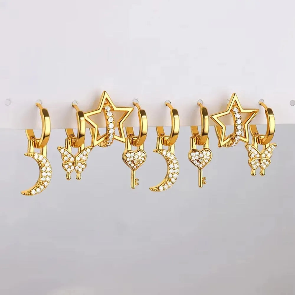 Women's copper geometric butterfly earrings with heart, bow and star details