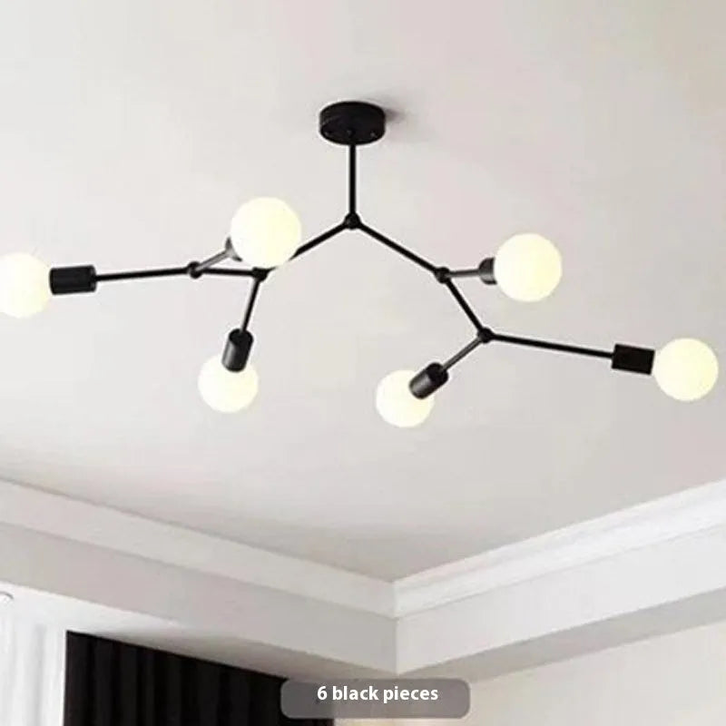 Nordic style black iron chandelier with multiple lights hanging from a ceiling
