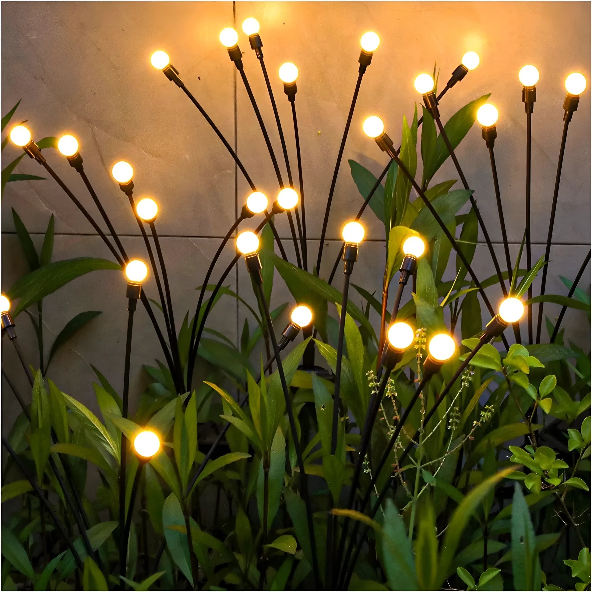 Solar-powered LED garden spike light with multiple firefly-like heads and a push-in pneumatic ground plug.