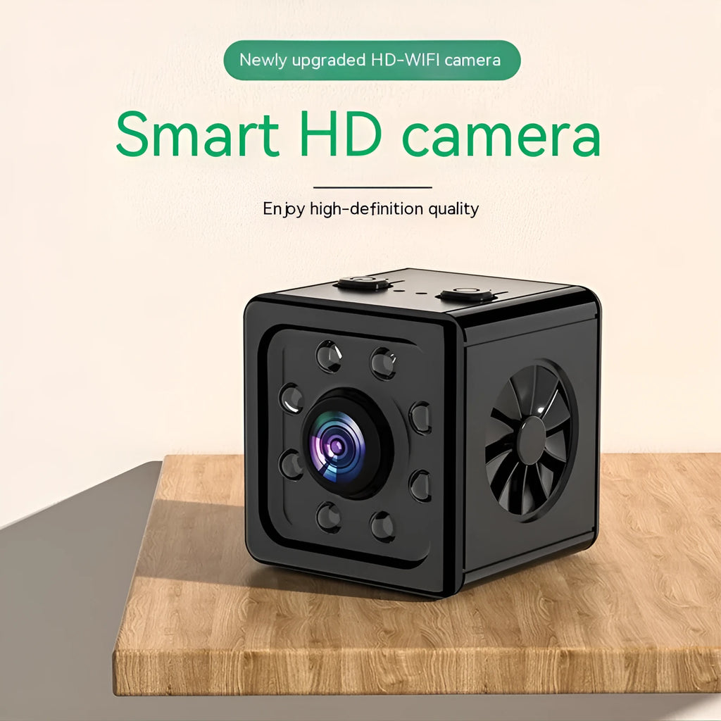 Black cubic K13 remote network sports camera with mounting bracket on a white background.