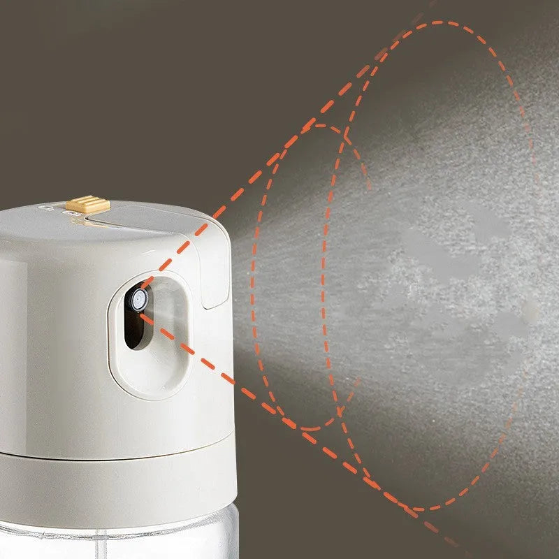 Warm grey glass oil sprayer bottle with switchable cover for spray and pour modes