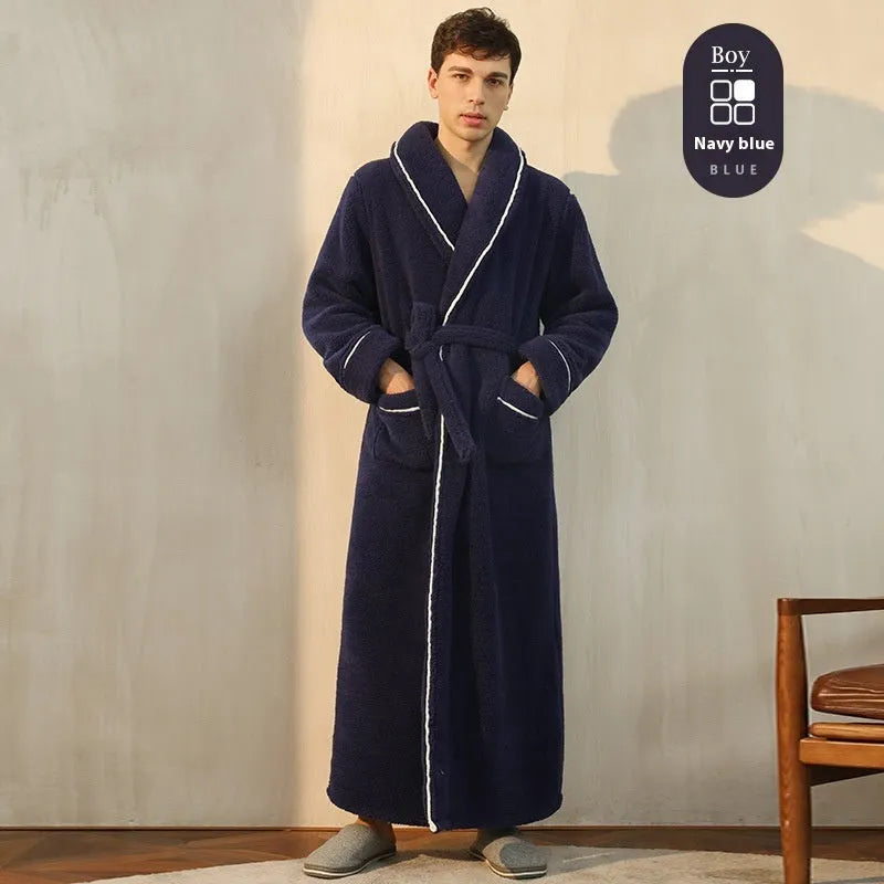 A man and woman wearing matching heavyweight navy blue flannel bathrobes, a couple's winter nightgown set.