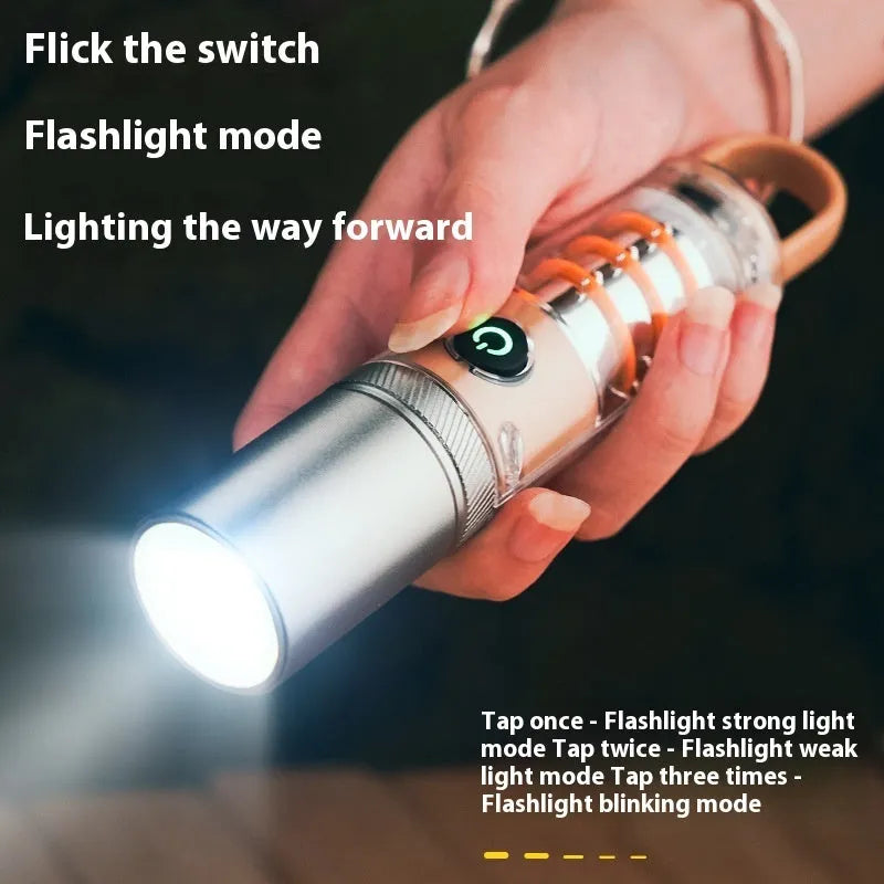 Orange 10W LED torch with optical zoom lens and keychain, shown with USB charging cable.