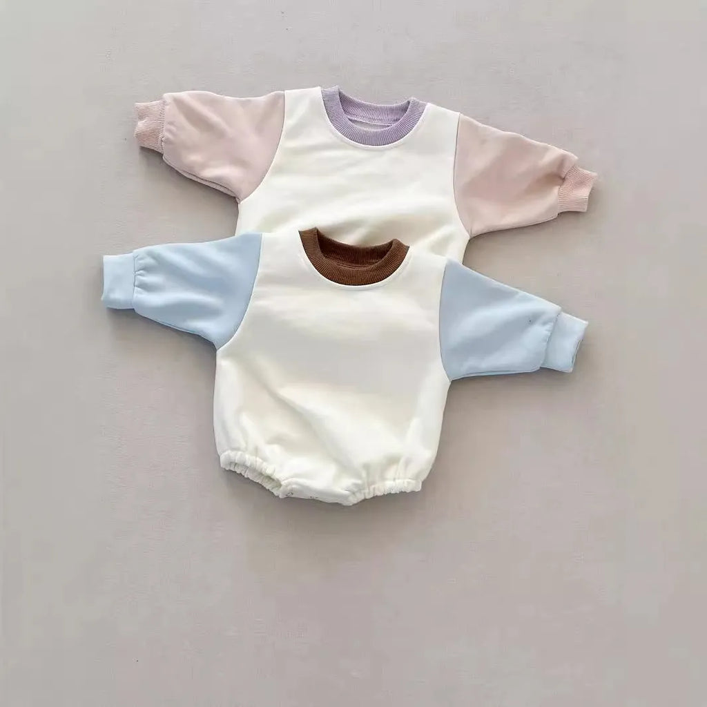 Baby romper in cotton triangle jumpsuit style with hidden hook closure, autumn weight, available in multiple colours