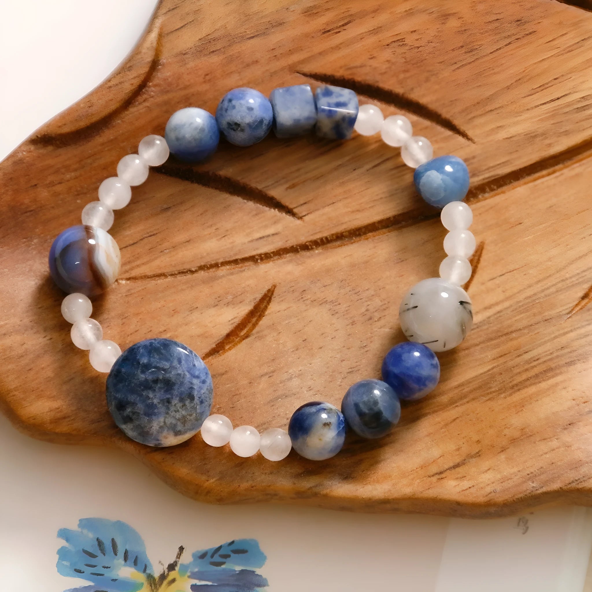 Hand-woven natural stone bracelet with blue point stone and black hair crystal agate beads