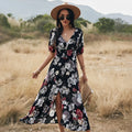 Yellow floral print dress on a hanger showing V-neck, short sleeves, elastic high waist, and full mid-length skirt.