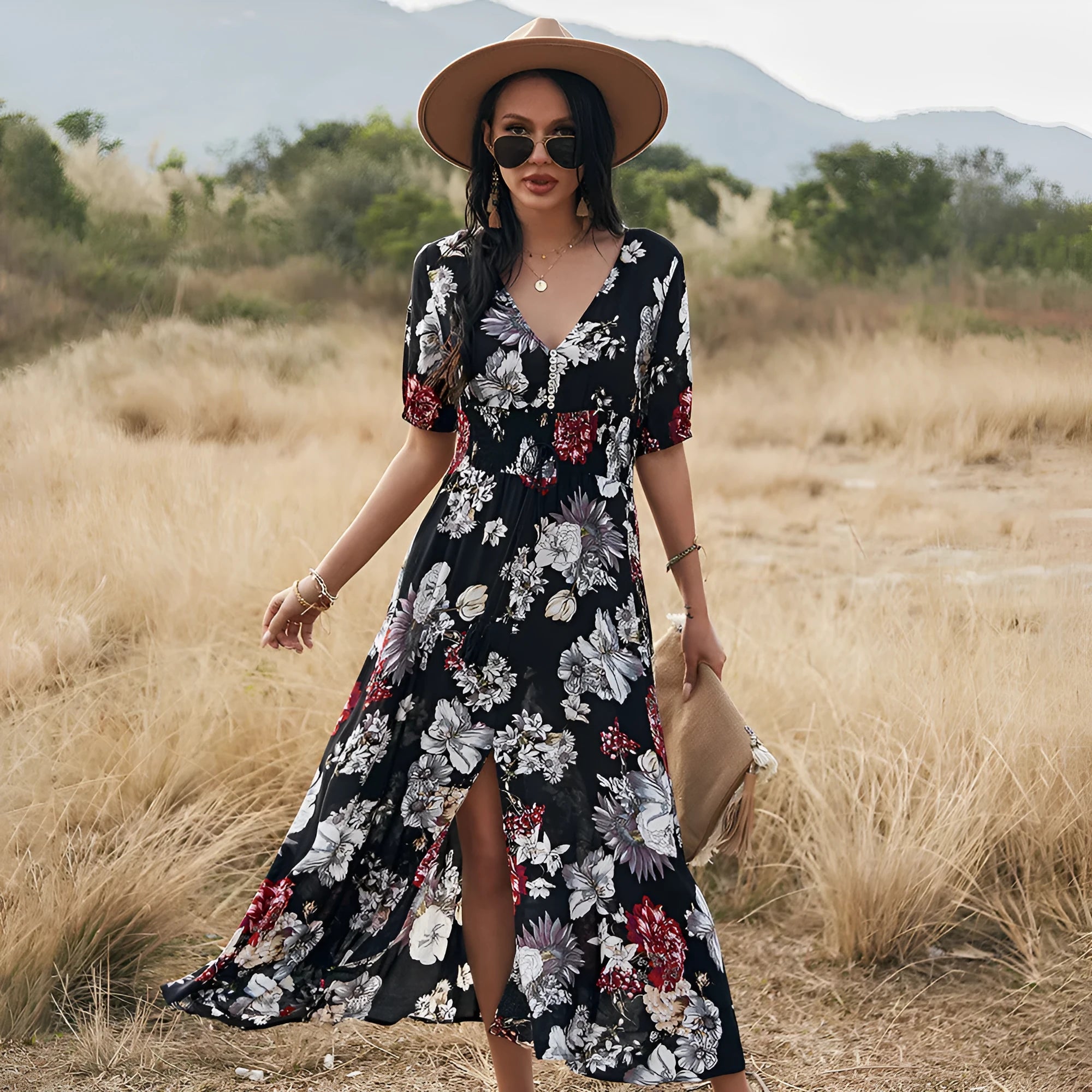 Yellow floral print dress on a hanger showing V-neck, short sleeves, elastic high waist, and full mid-length skirt.