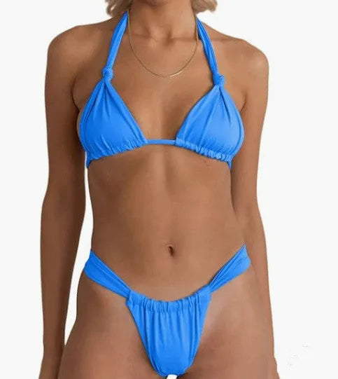 Women's pleated strap knotted bikini swimsuit in a solid colour on a mannequin.