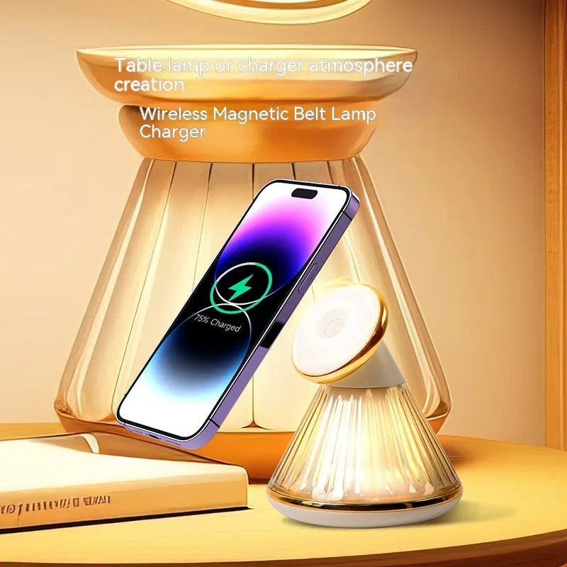 Champagne gold night table lamp with integrated magnetic wireless charging seat on its base.