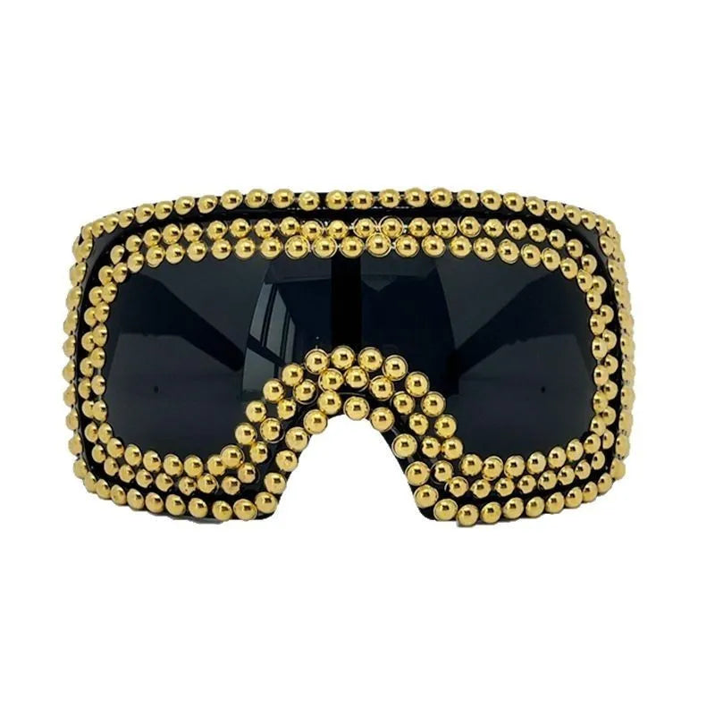 Men's silver square sunglasses with large 140mm rim and rivet details on black background.